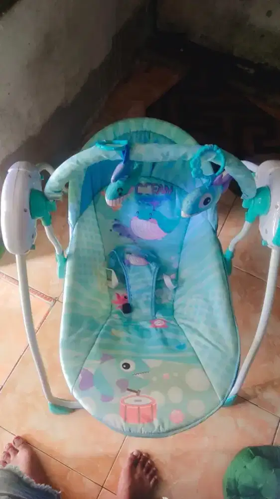 Ayunan bayi elektrik dan manual