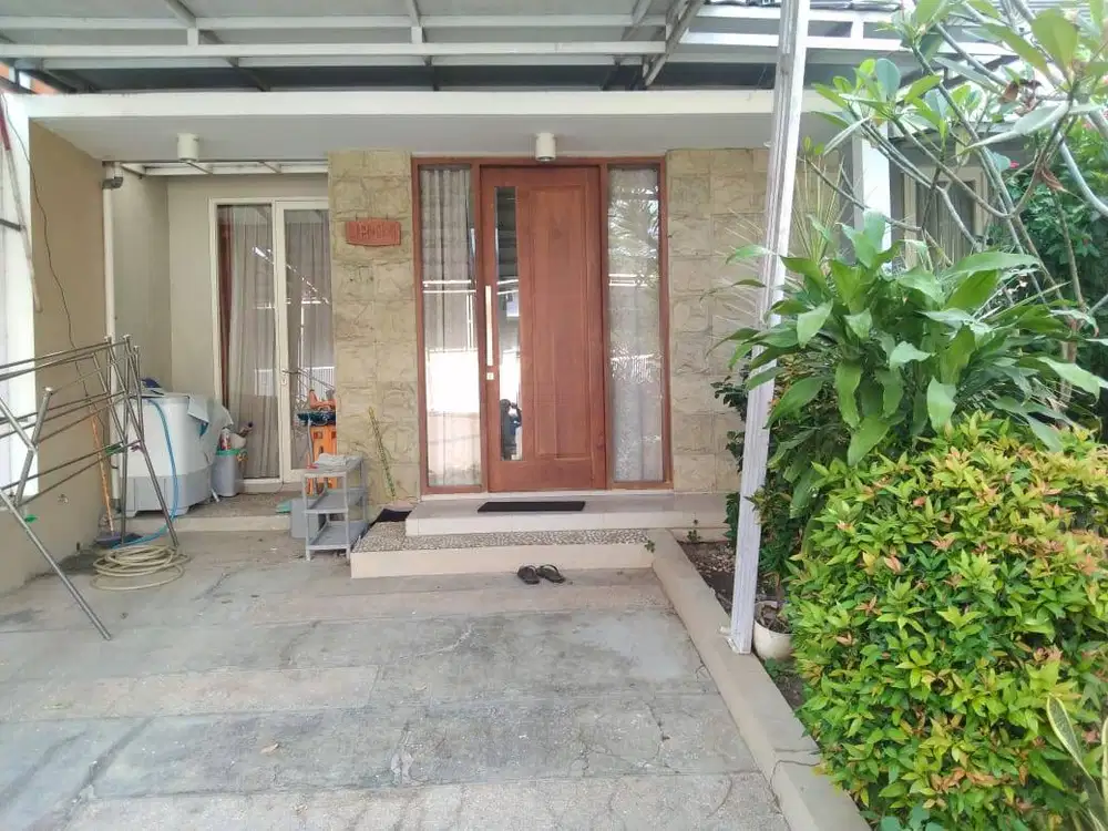 Rumah gandeng hadap barat dan timur