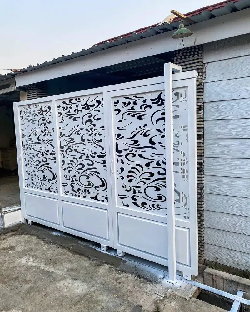Pagar rumah motif cutting