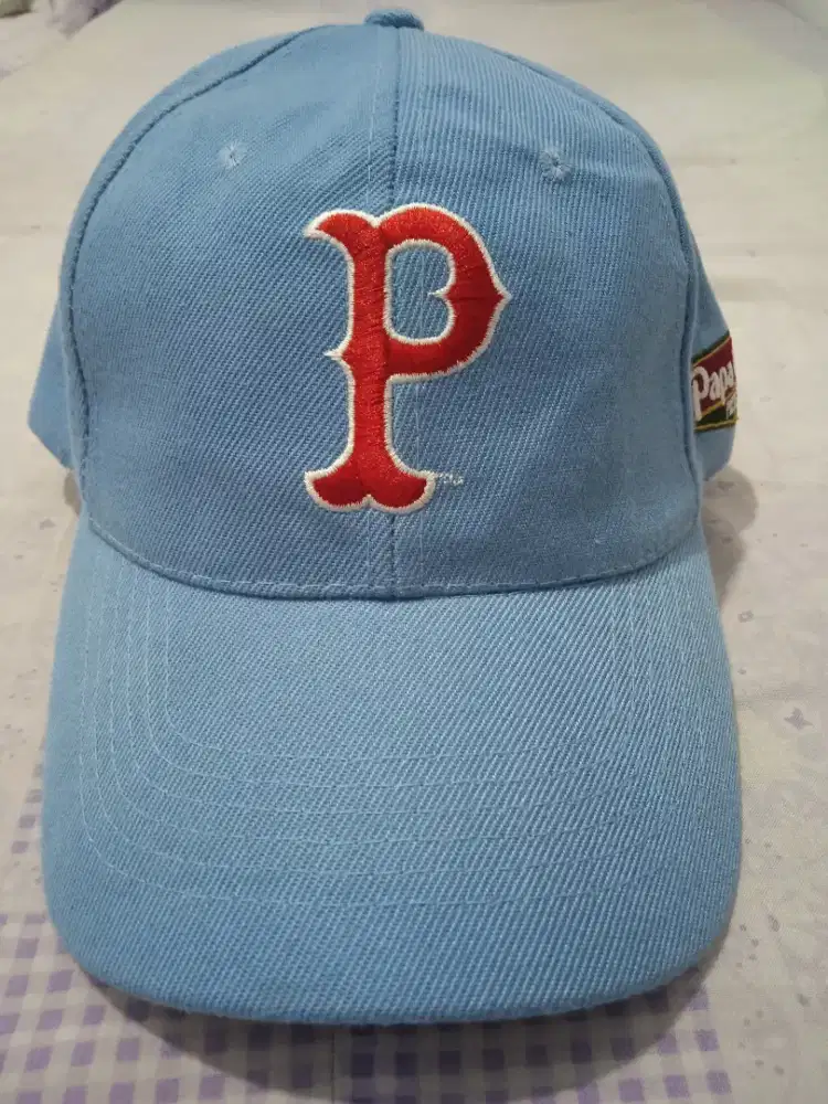 Topi logo P like new