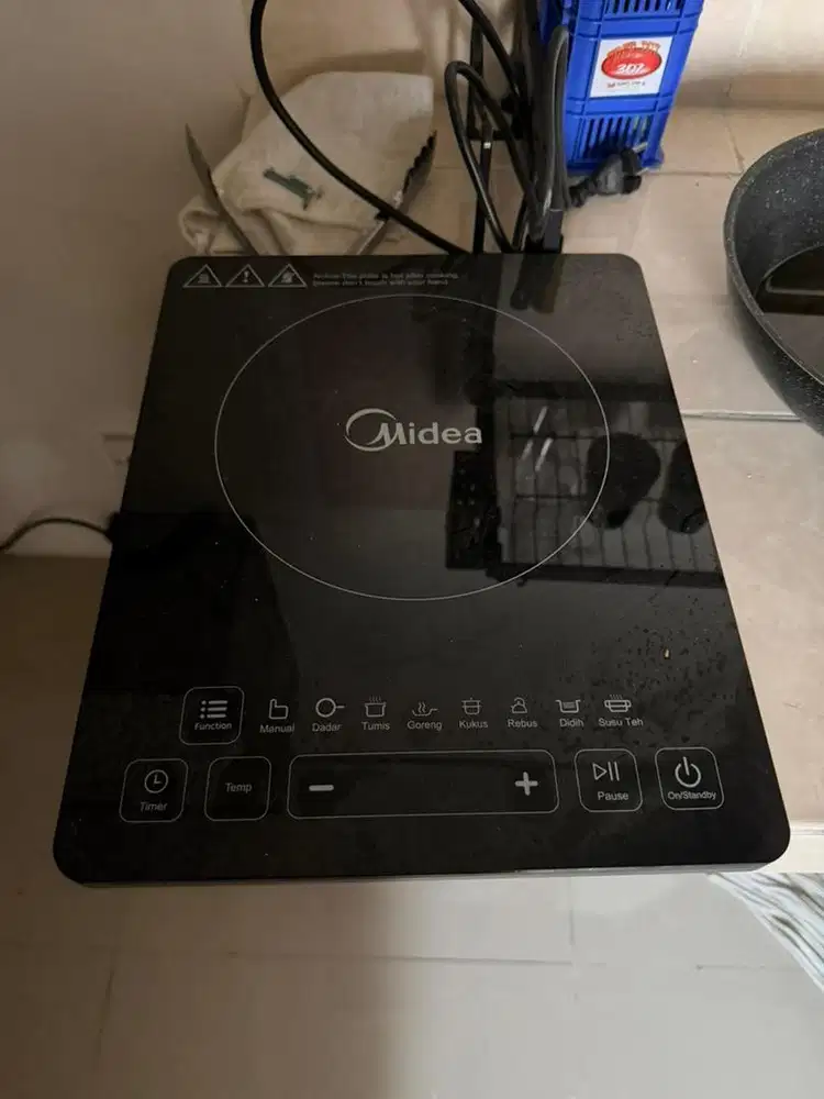 kompor listrik midea