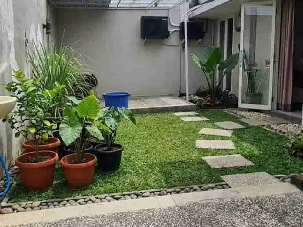 Dijual Rumah Dengan Taman di Green Hill Citraland Utara Terawat Siap Huni