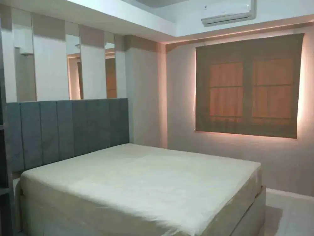 Dijual Unit Gress Apartemen Puncak Dharmahusada Tower A  3BR Jadi 2BR Semi Furnished