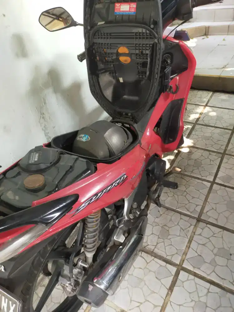 Honda Supra Helm-In 125 F1 PGM-F1Tahun 2012