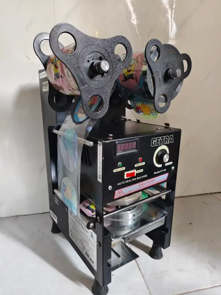 Cup sealer Getra semi otomatis