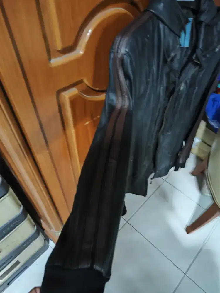 Jaket kulit kualitas super expor ada kupluk tutup kepala Keren kulitn