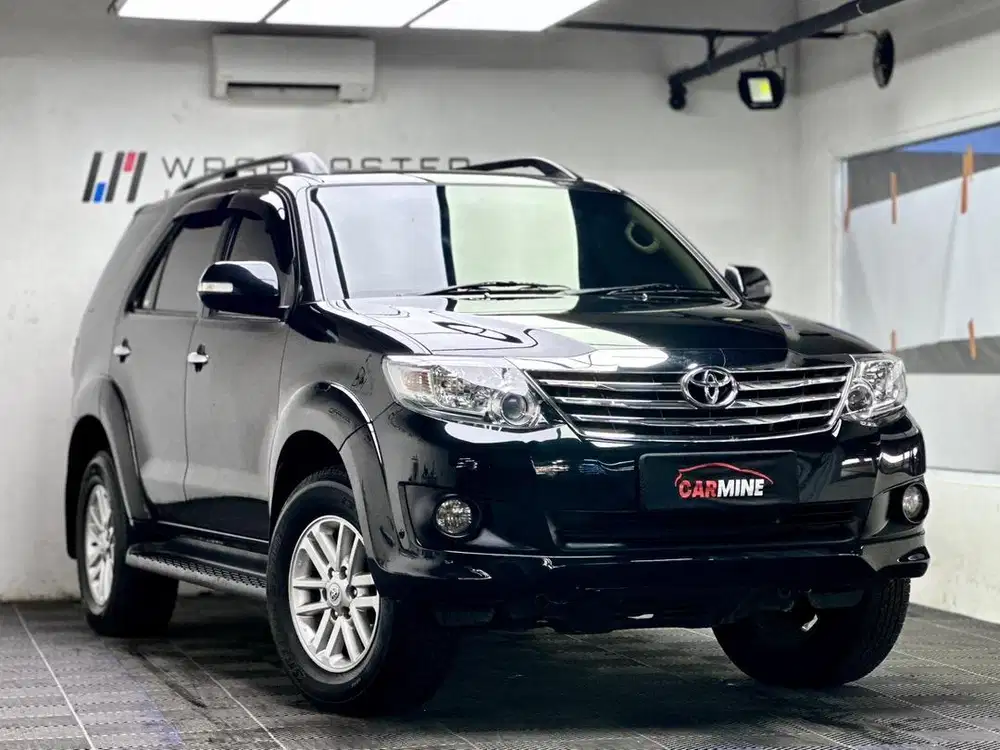 Toyota Fortuner 2.7 G Luxury AT Bensin 2011 Hitam Tangan Pertama 2012