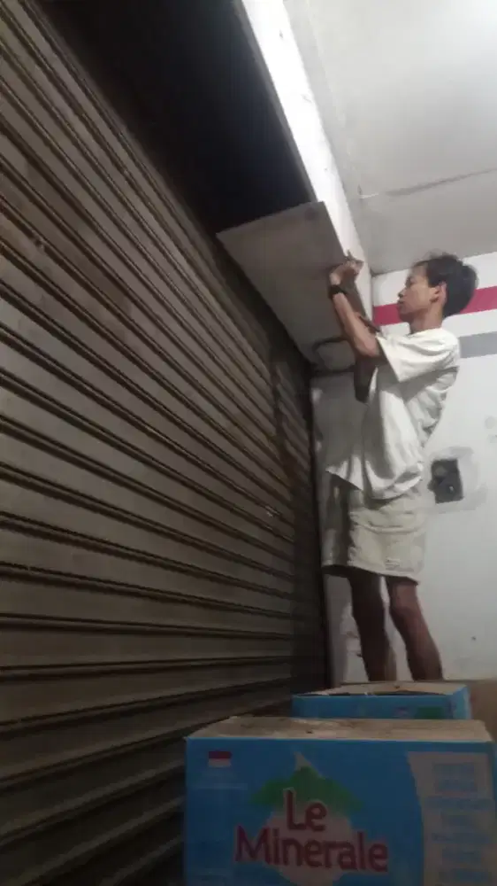Tukang spesialis service rolling door dan folding gate murah cepat