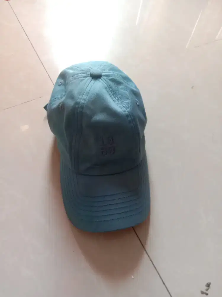 topi eiger hijau tosca