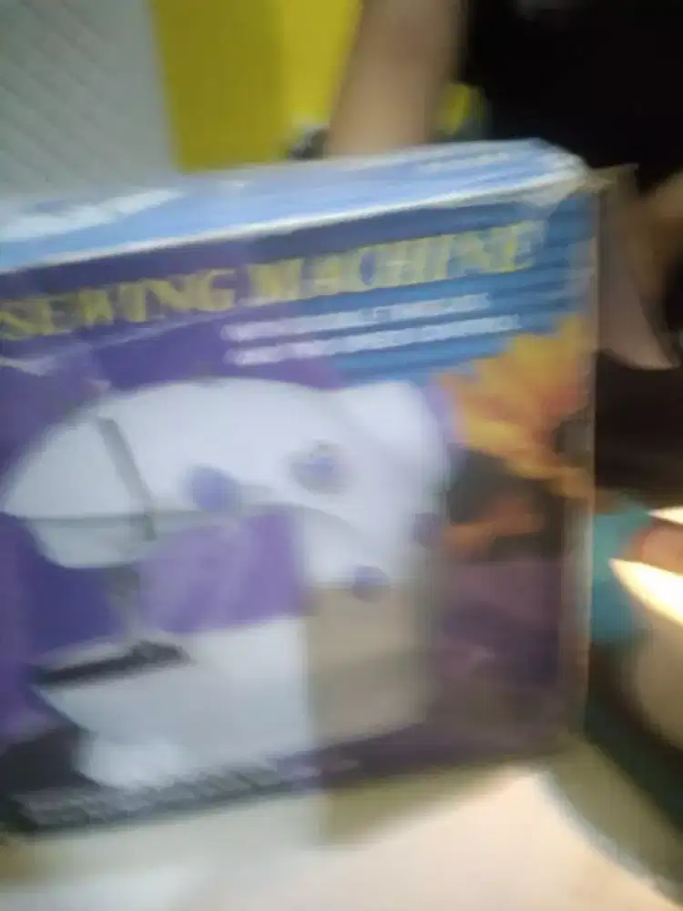 Mesin jahit mini