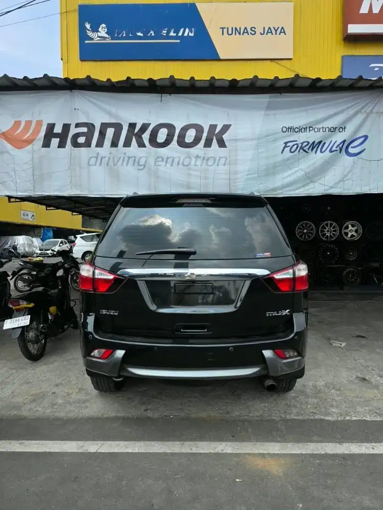 isuzu Mux barcode solar # innova pajero fortuner