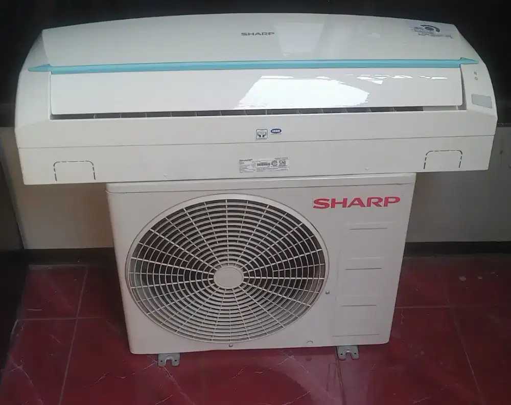 Ac 1/2 pk Sharp + pasang + kartu garansi