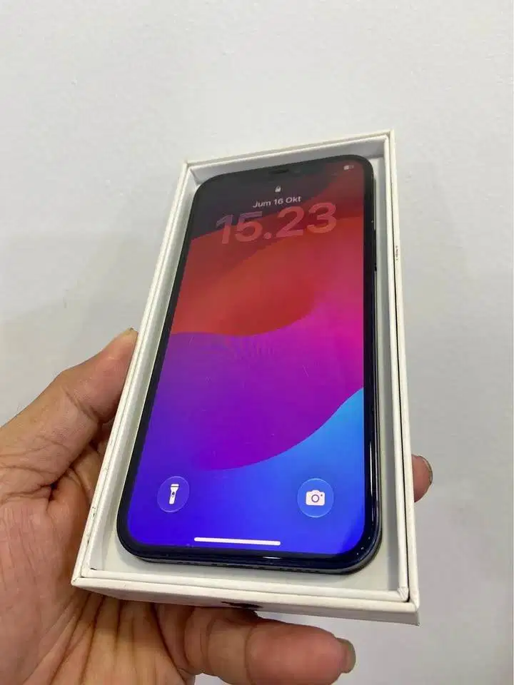 Second IPHONE 12 64gb beacukai Welldutt