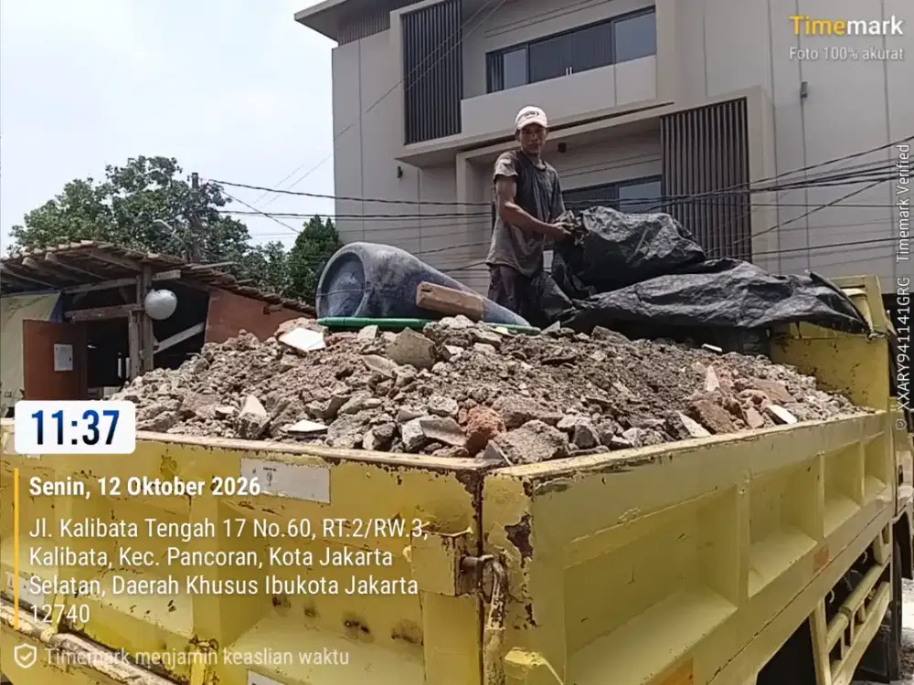 Jasa buang puing tanah