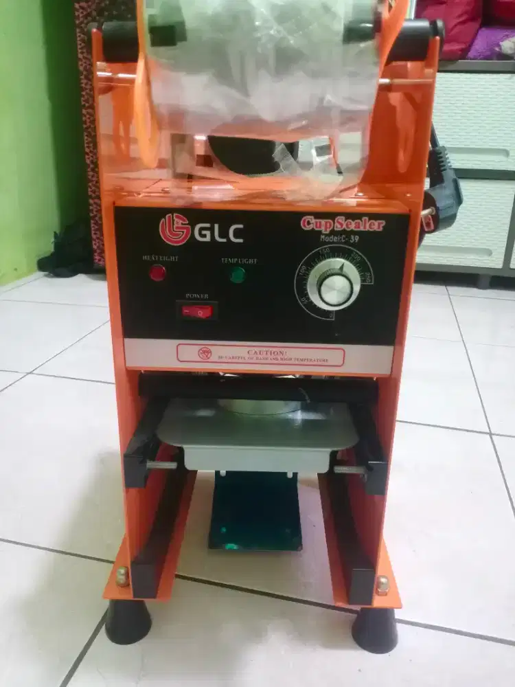 Mesin pres minuman GLC Normal