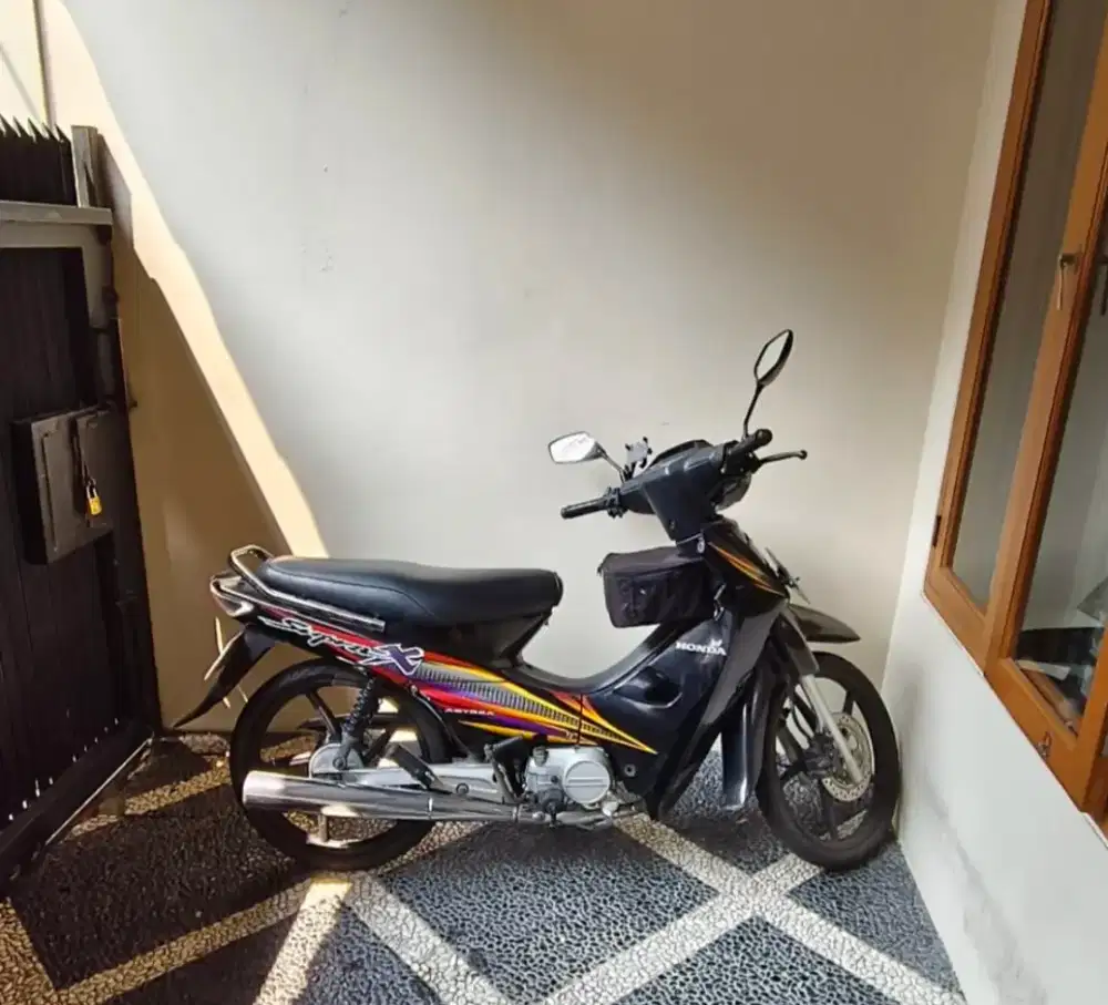 Supra X 100 cc tangan 1 dari baru