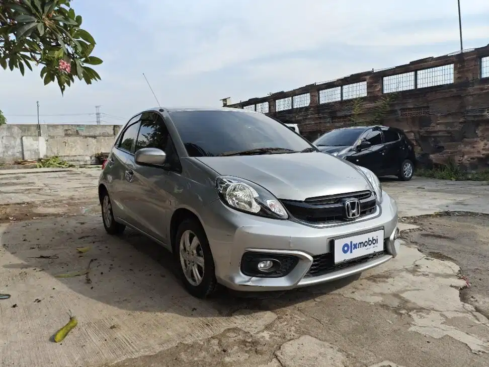 DP MURAH Honda Brio Satya 1.2 E Bensin-AT 2017 Abu CUAKD