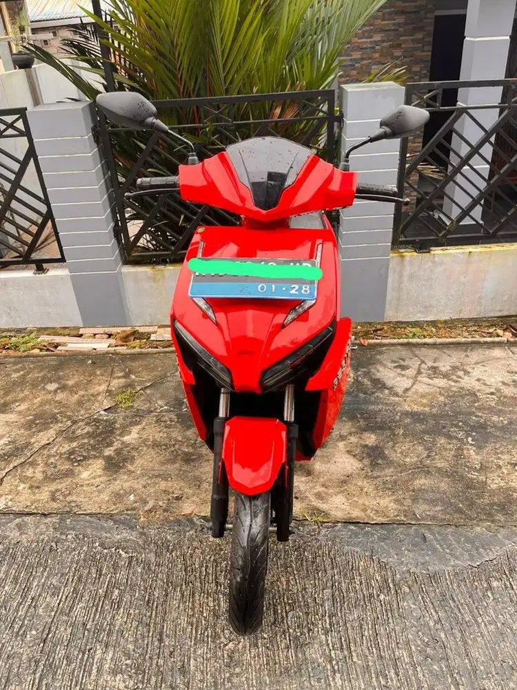 Motor listrik gesit warna merah