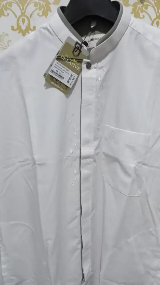 Baju Koko al-Mia