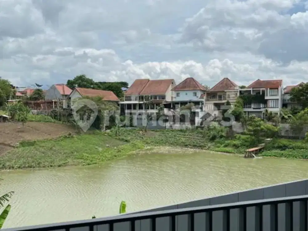 Rumah Tropical Minimalis Dengan Sentuhan Japan Zen Garden Serta View Danau Di Kota Baru Parahyangan