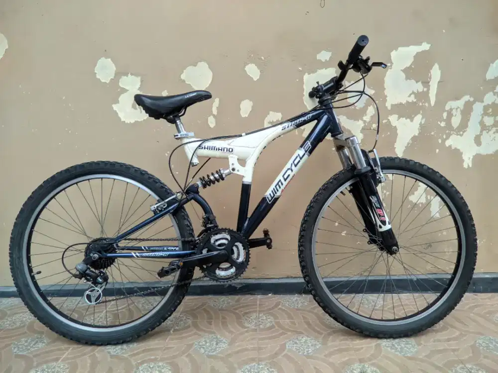 di jual sepeda wimcycle string r double shock aluminium