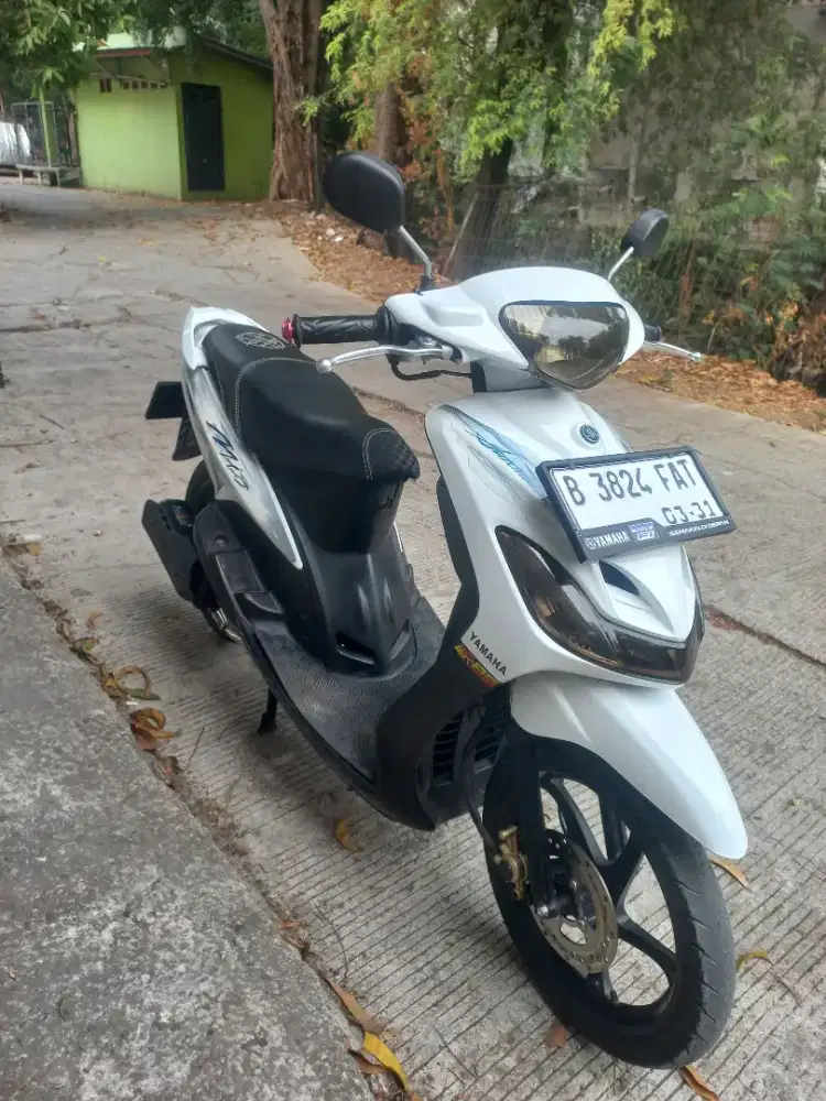 Mio smile putih