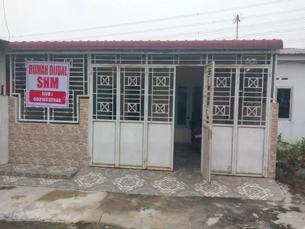 Dijual rumah siap huni, cantik, didalam area perumahan, SHM.