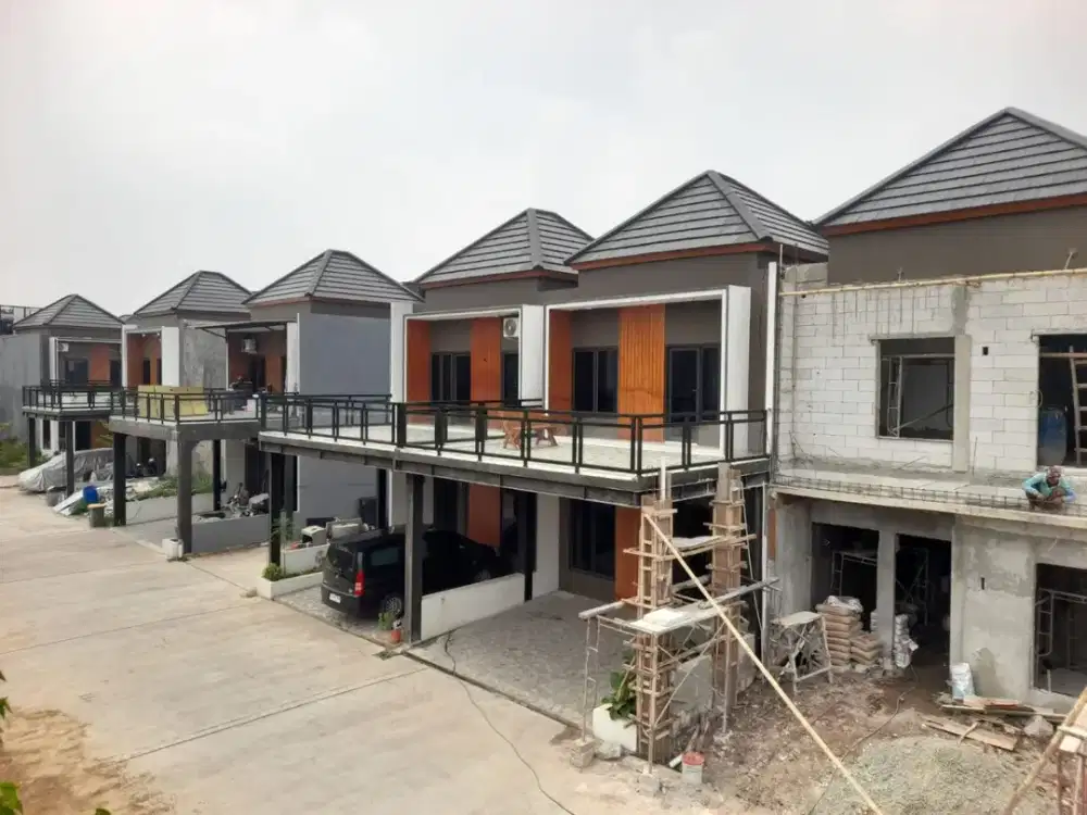 Rumah mewah 2lanrtai siap huni lokasi pinggir jalan raya jatiwarna harga 900juta an