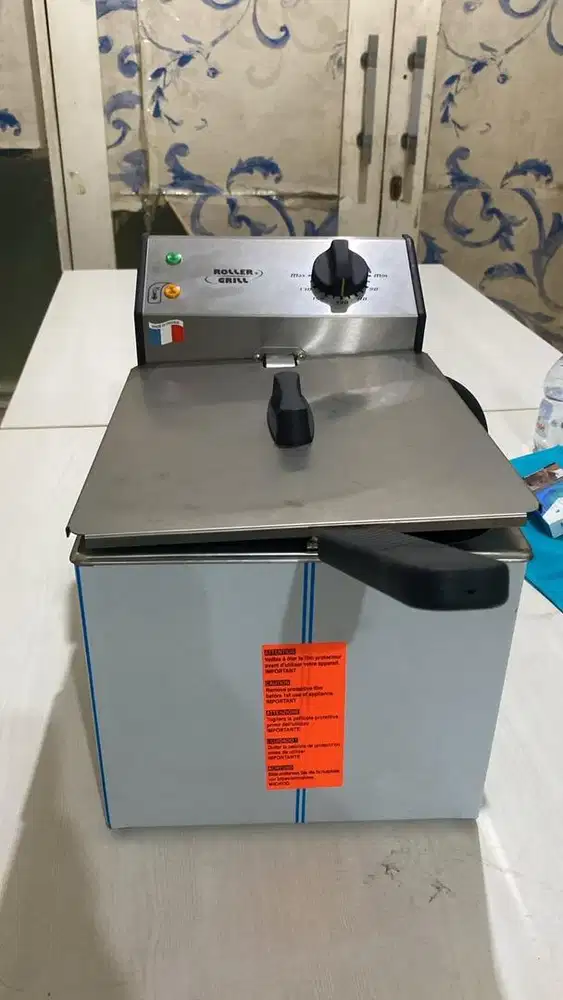 Roller grill deep fryer