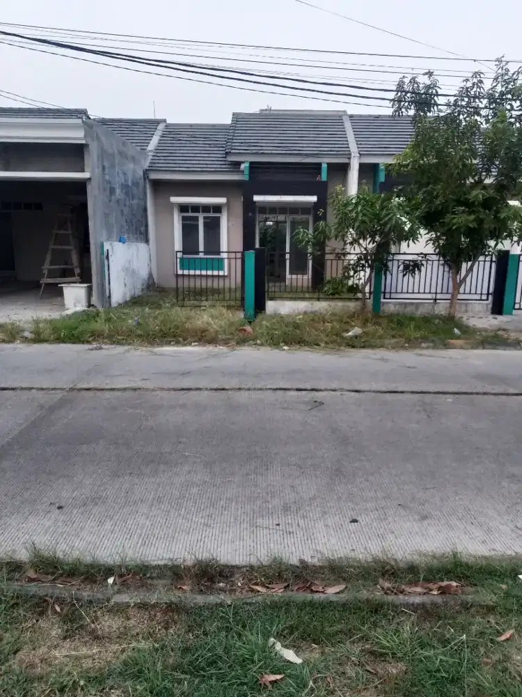 Over kredit rumah lokasi strategis pinggir jalan utama