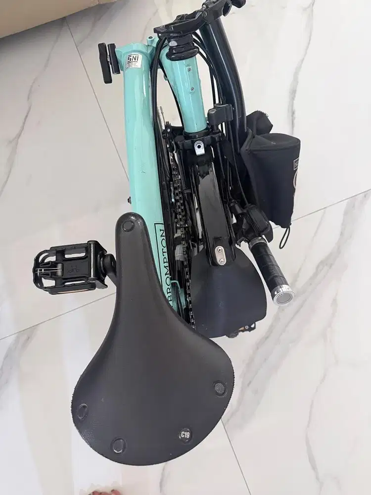 Brompton Black Edition folding bike in a Turkish Green colorway