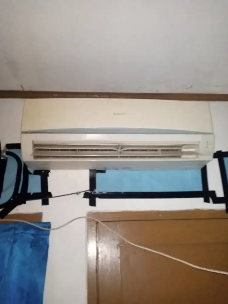 Ac sharp 1/2PK dingin dan ada remot