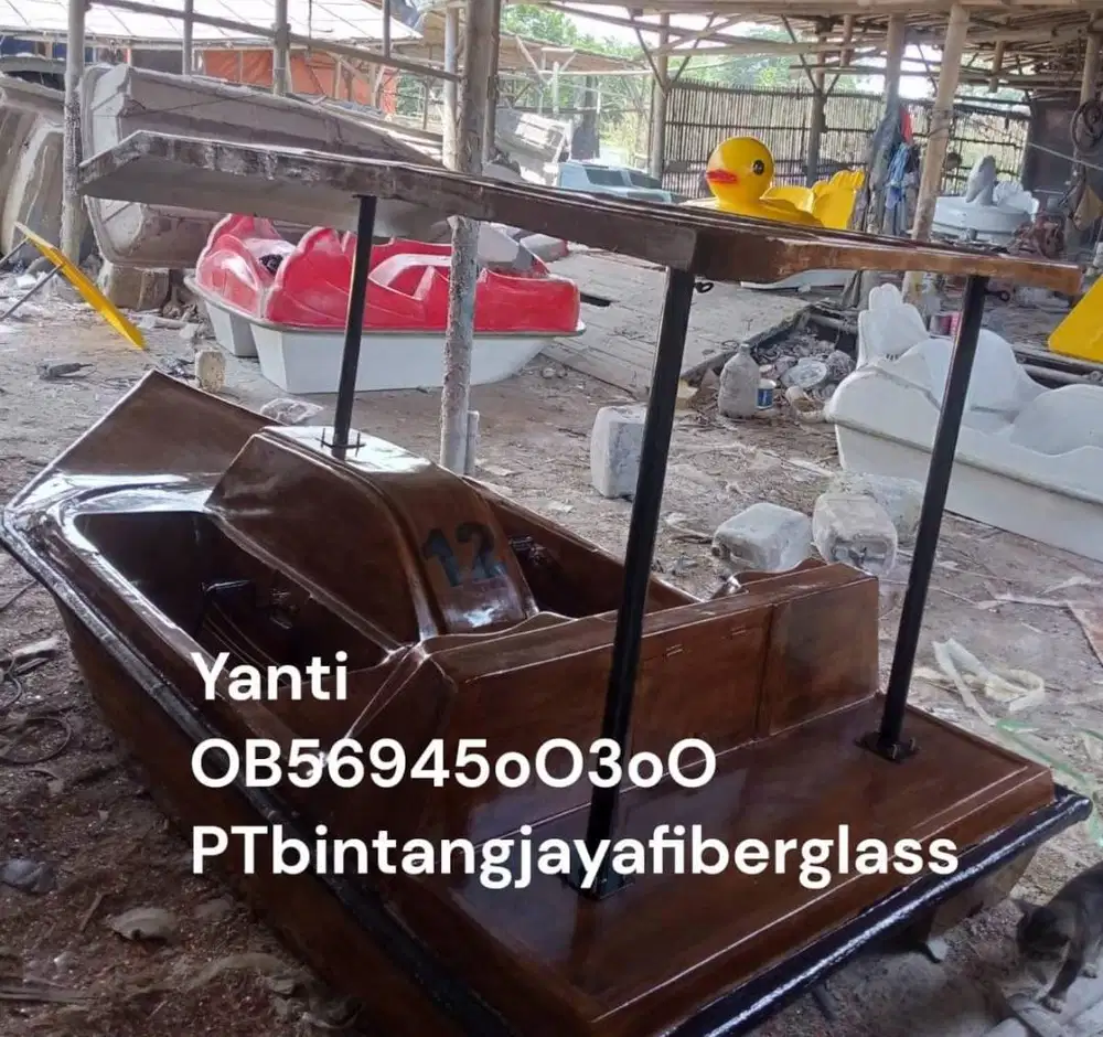 sepeda model perahu warna kayu,perahu wisata danau goes