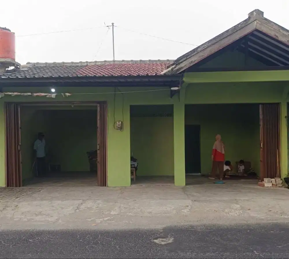 Dikontrakkan rumah usaha pinggir jalan