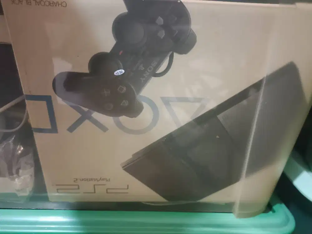 PS 2 plus dgn stik 2 bh, 2 kaset game