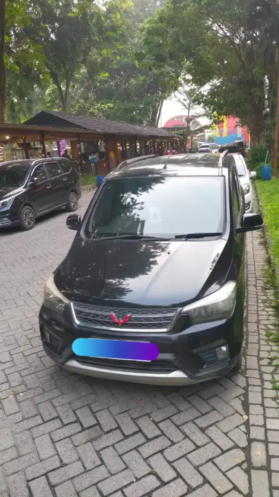 Wuling Confero S tipe L Lux Bensin M/T Captain Seat