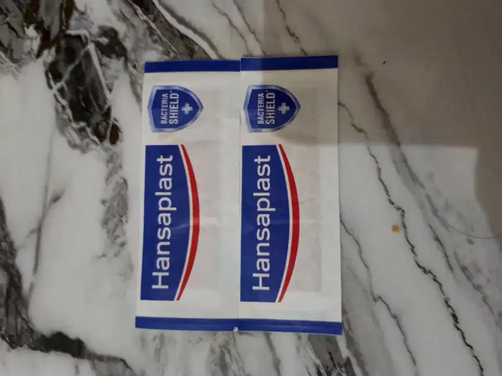 • Hansaplast Kain Elastis Plester Luka Standar Anti Infeksi Isi 2