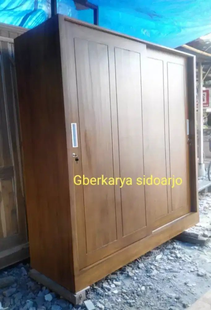 Lemari sleding kayu jati costum