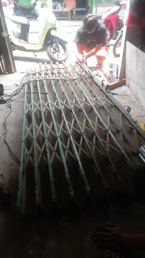 Service rolling door folding gate murah area depok beji