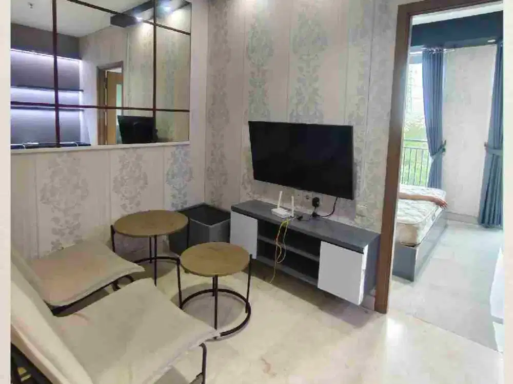 disewakan 1BR  Furnished Apartemen Puri Orchard hadap timur.