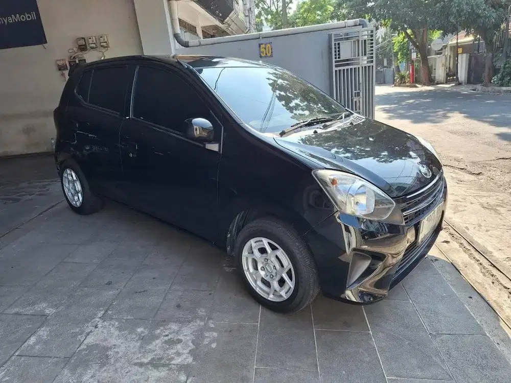 KM 67RB AGYA MANUAL 2014 HITAM TOYOTA E M/T