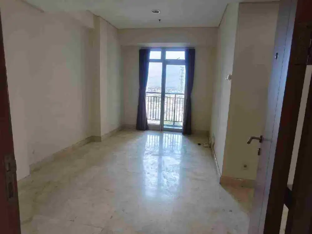disewakan 2BR  unfurnished Apartemen Puri Orchard hadap timur