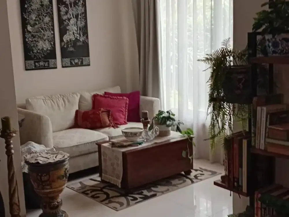 Rumah Rempoa dengan Taman Depan dan Carport Dua Mobil