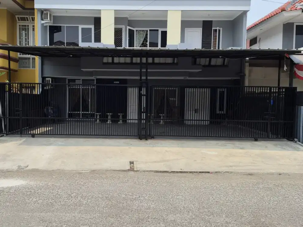 DISEWAKAN Rumah 2 Lantai dengan  10 Kamar Tidur yang Rapi, Nyaman dan Siap Huni dengan Lokasi yang sangat Strategis di Taman Modern, Cakung