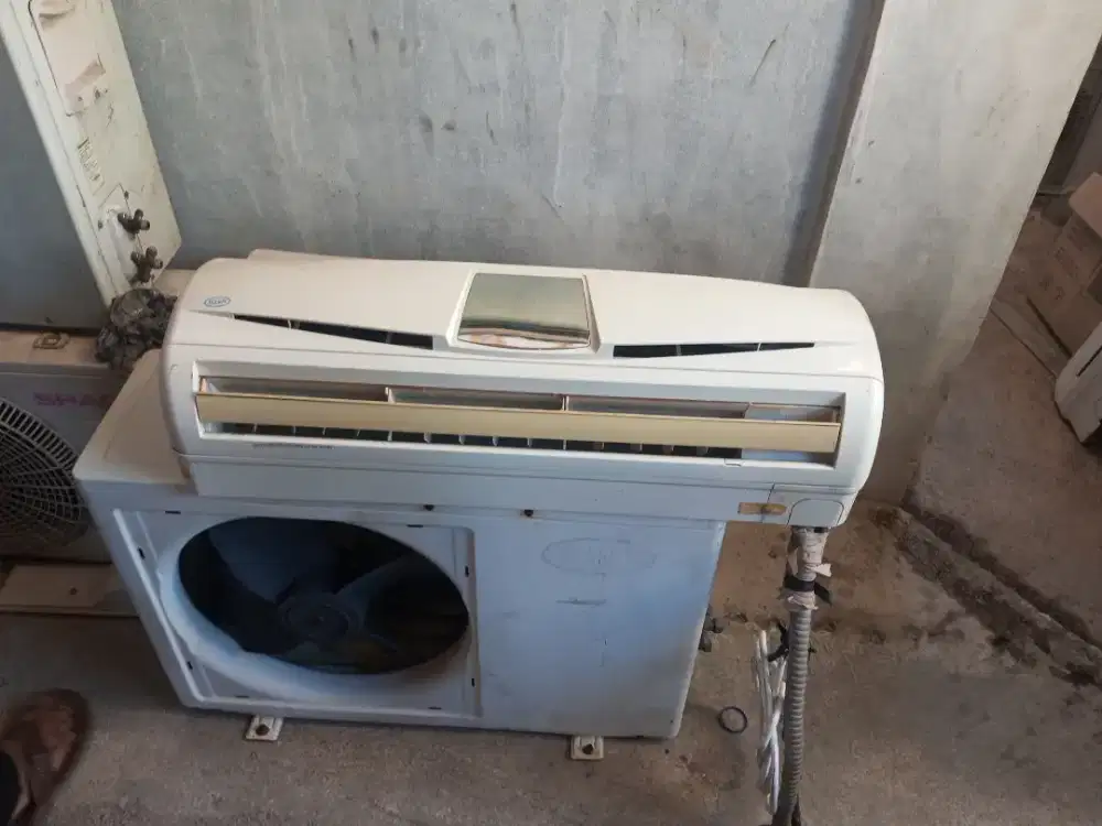 Service AC dan bongkar pasang