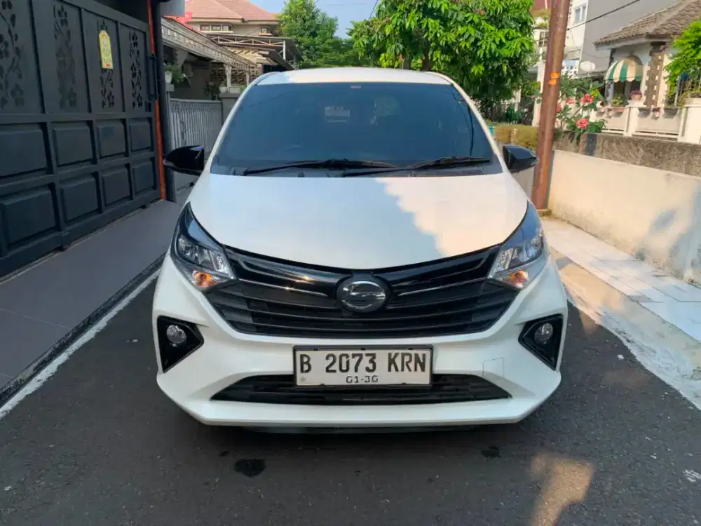 Sigra R Deluxe MT 1.3