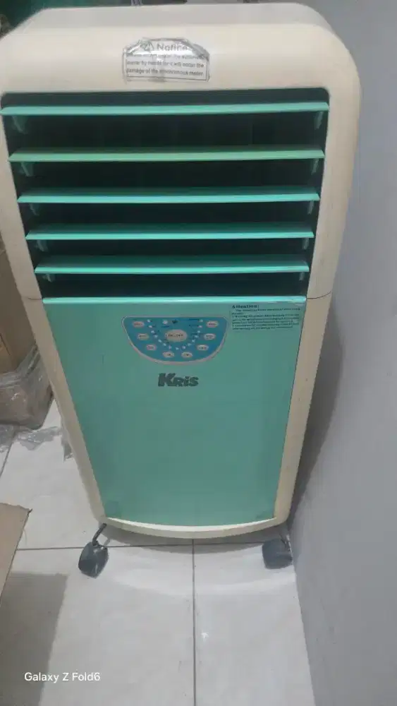 Kipas angin dgn air pendingin.