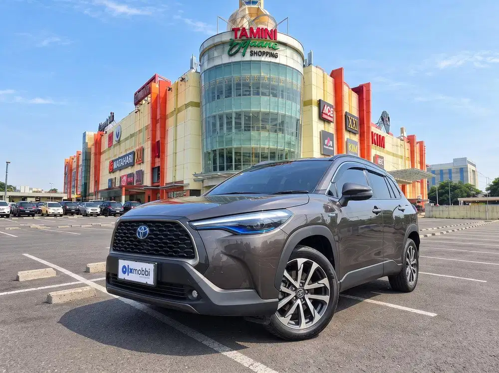 Angs Murah Toyota Corolla 1.8 Cross Hybrid Bensin-AT 2021 Coklat CAAMF