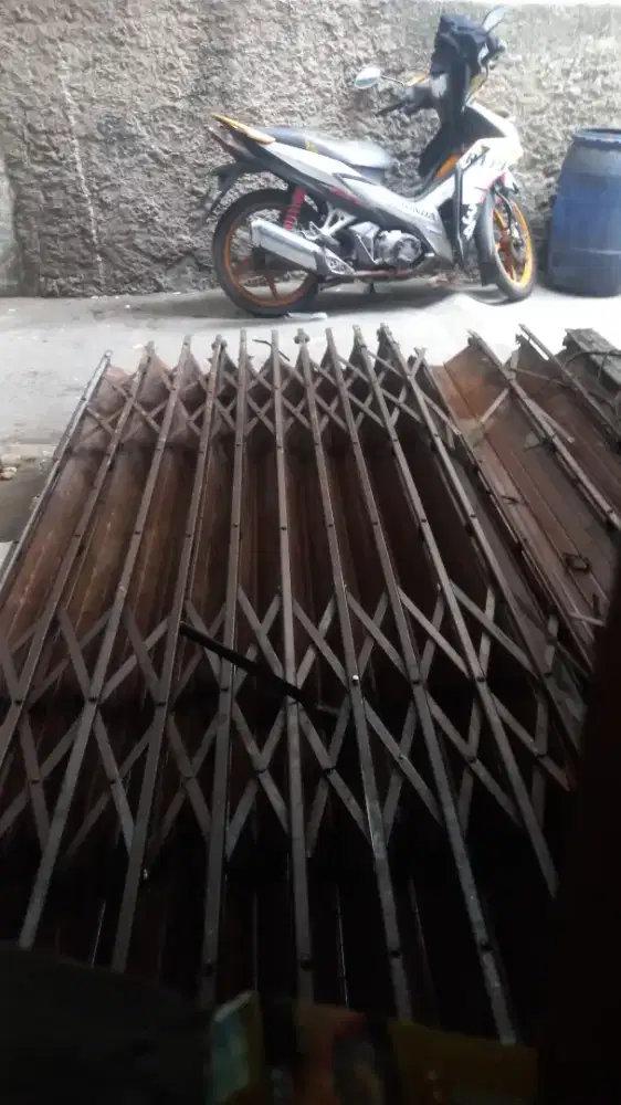 Tukang reparasi service rolling door folding gate