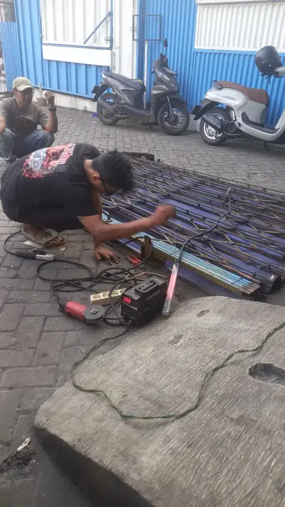 Tukang reparasi service rolling door folding gate murah